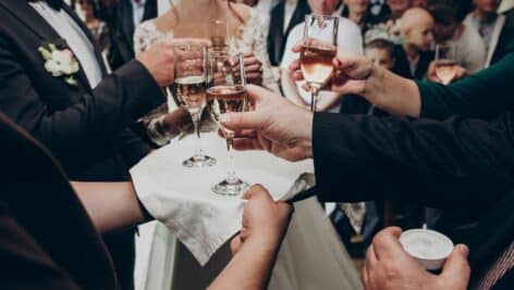 wedding guests toasting with champagne