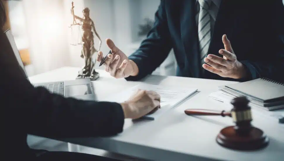 Law, Consultation, Agreement, Contract, Attorney or Lawyer holding a pen is consulting with a client to explain the pattern of answering questions before going to court to decide a lawsuit