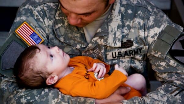 Army man with baby