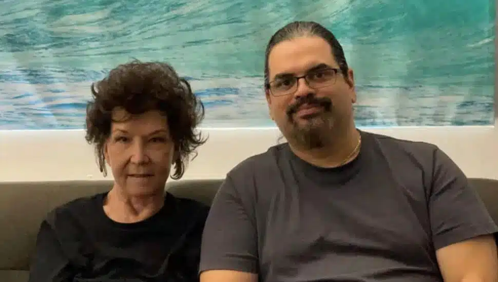 two friends seated side-by-side Chris Wiley and Phyllis Procopio
