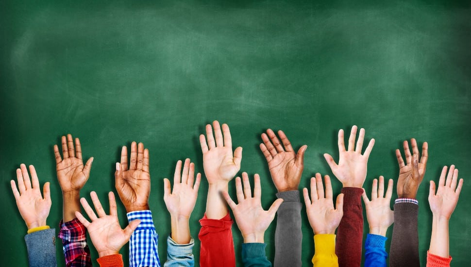 Group of Multiethnic Diverse Hands Raised