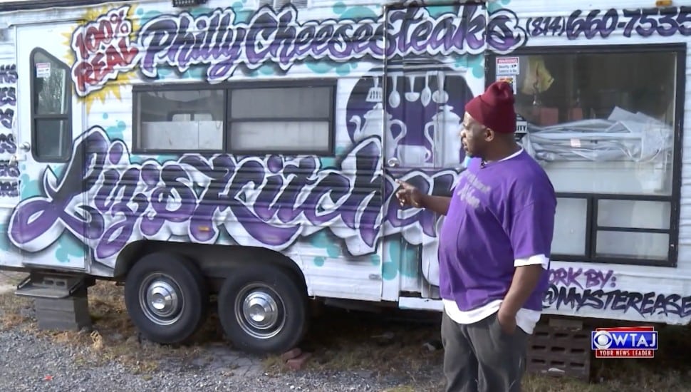 Tyrone Stewart in front of Liz's Kitchen.