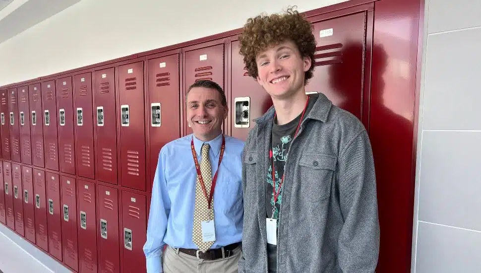 From left, Robert Gregory, AGHS English teacher and Devil’s Herald newspaper advisor, and Jackson Morris, 12th grade student and Devil’s Herald senior editor.