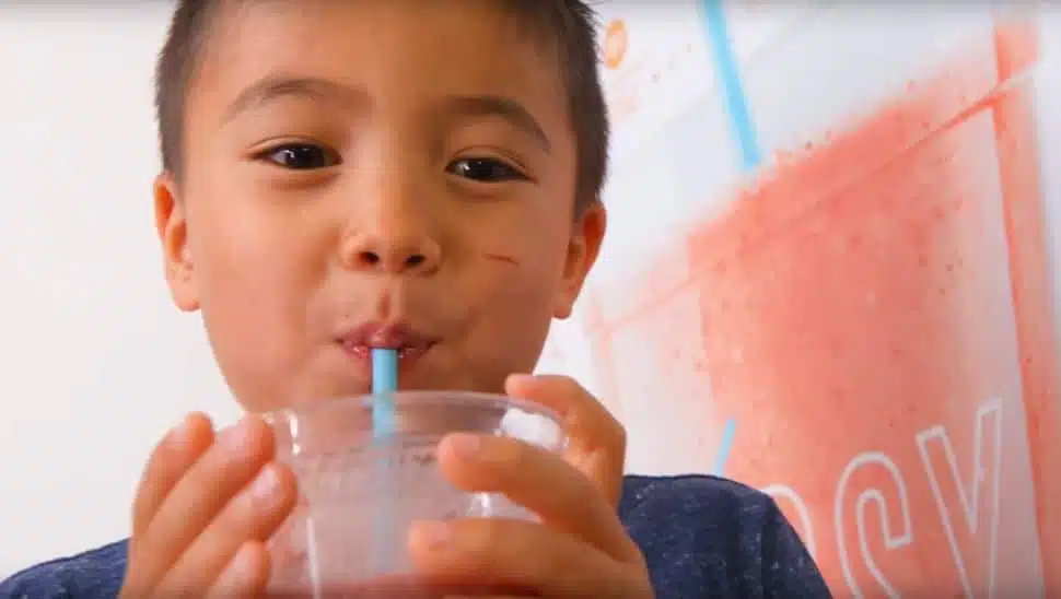 child drinking a Bleni blends