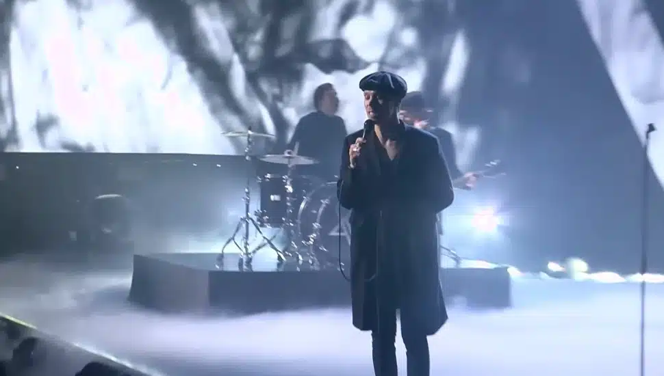 Ville Valo performing onstage.