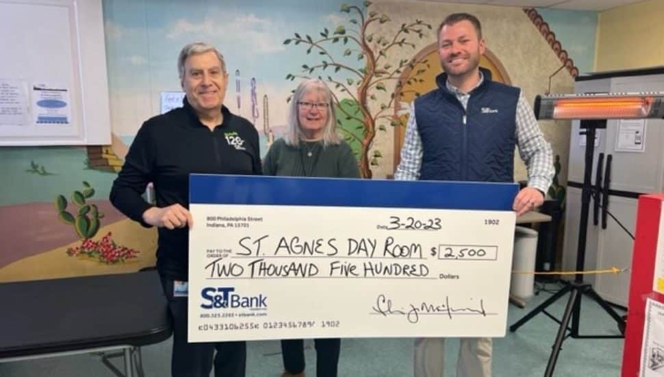 From left, Frank Monterosso, Brand Ambassador at S&T Bank, Barbara Kirby, Director of Outreach Services at St. Agnes Day Room, and James Robinson, VP Regional Manager at S&T Bank.
