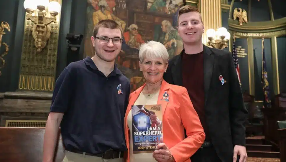 From left, Josh Stehle, Senator Comitta, and Zach Stehle.