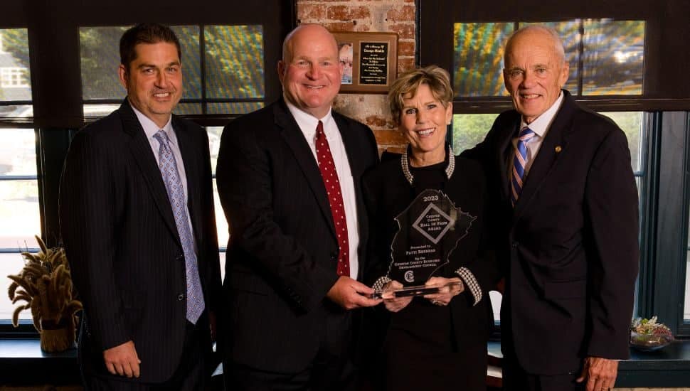From left, CCEDC President and COO Mike Grigalonis, CCEDC Board Chair Craig Styer, Patti Brennan, and CCEDC CEO Gary Smith.