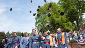 The 36 graduating cadets do a traditional hat toss after graduating from Valley Forge Military College in Wayne