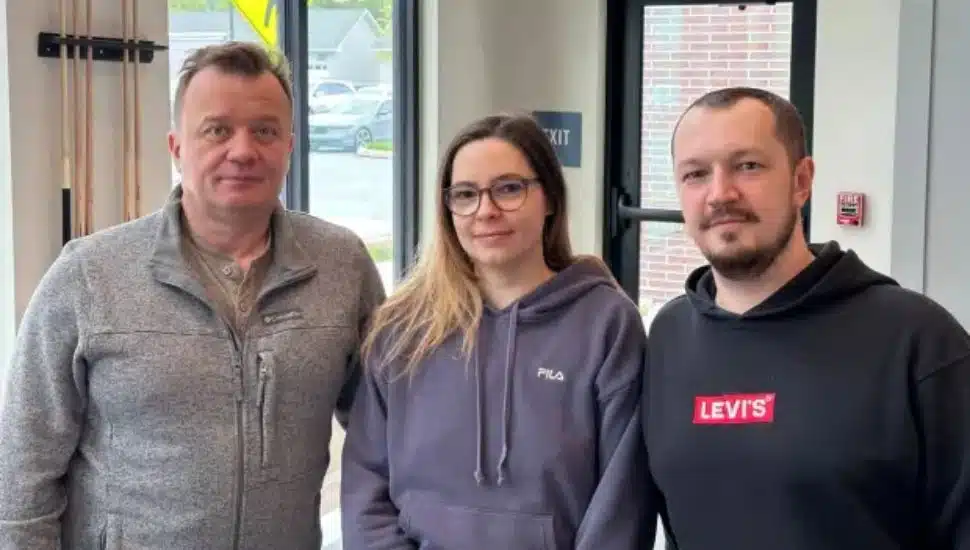 From left, Uladzimir Tsimashevich, Anastasiia Melnikova, and Alex Melnikov.