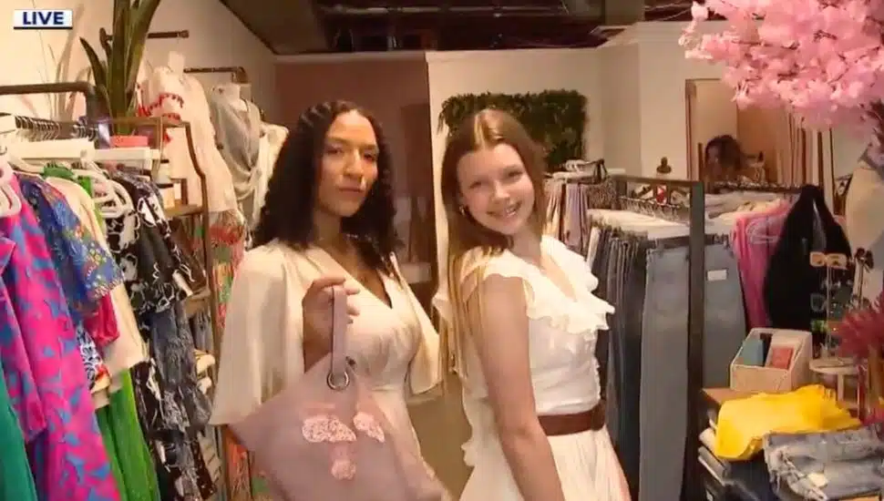 two women wearing complementing outfits
