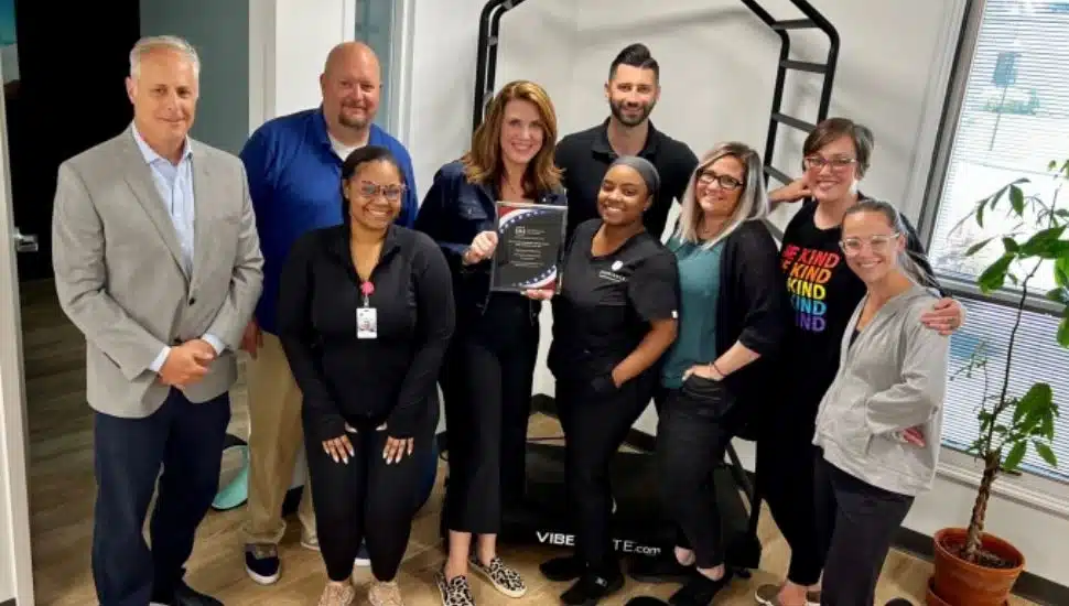Dr. Brandie Keates, center, with members of Experience Chiropractic.
