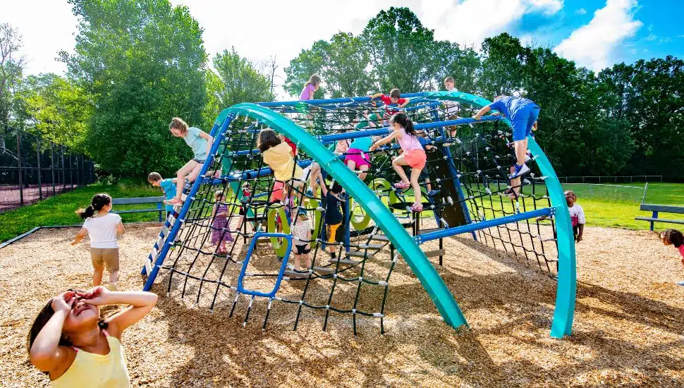 Kids climbing on the Crab Trap.