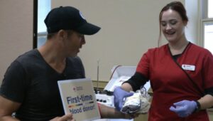 Adam Joseph donating blood for the first time.