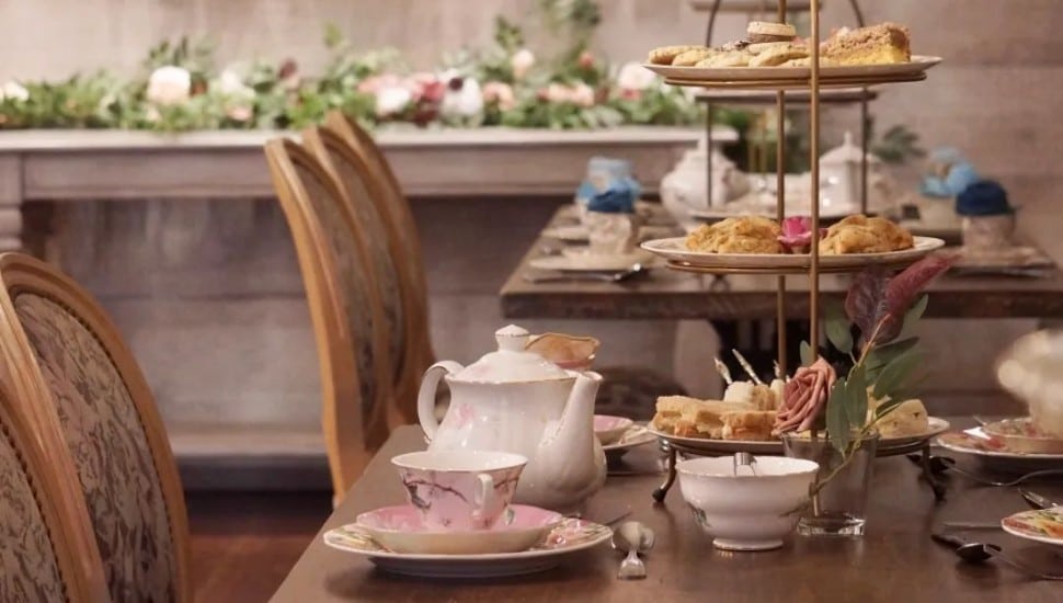 tea table spread with sweets on table at mimi's tea cottage