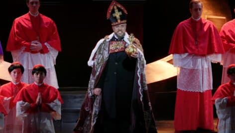 Stephen Powell performing in an opera.