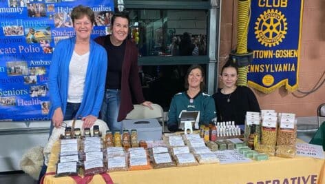 West Chester co-op members at a farmer's market