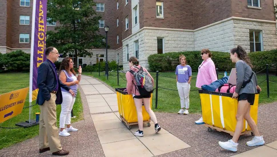 WCU President Christopher Fiorentino greets first-year students moving into campus