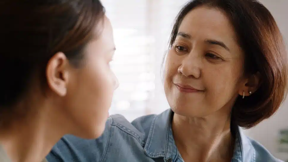 A mom talks to their child about mental health issues.