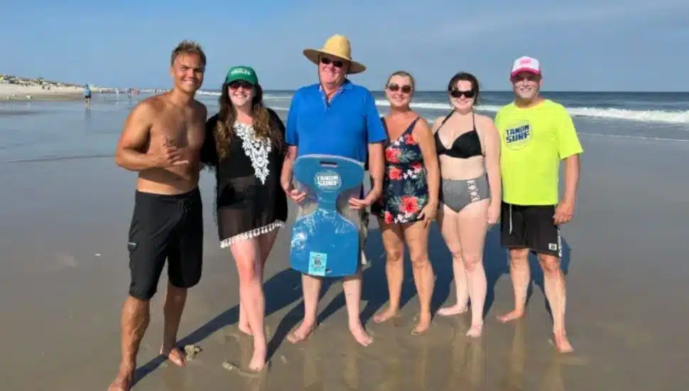 Steve Houser, Gabe McCabe, and others on the beach