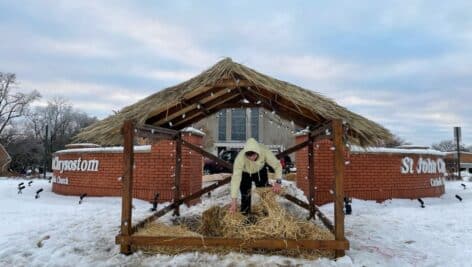 Logan D., one of the Eagle Scouts, built a Nativity Frame for St. John's Chrysostom Church.