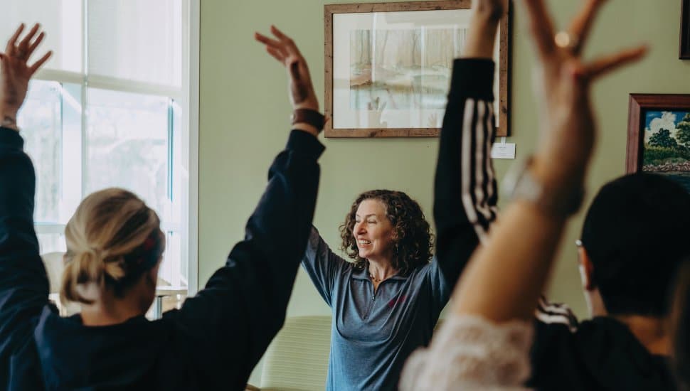 women doing Yoga at Unite for HER