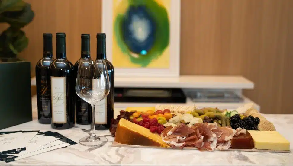 wine bottles and charcuterie board