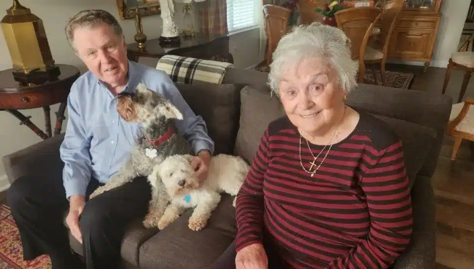 Robert Burns with his wife, Elizabeth, and their two dogs.