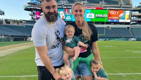 Jason and Kylie Kelce pose with their three daughters Bennett, Elliotte, and Wyatt.