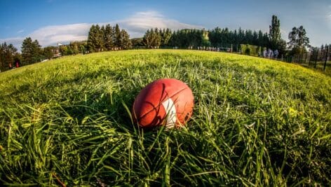 football on grassy field