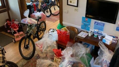 A room full of toys and gifts collected from a previous holiday gift drive