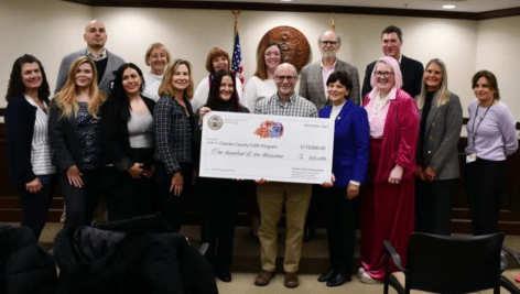 commissioners present check for Chester County Color 5K funds