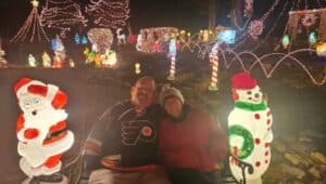 Gary and Deb Habermann in front of their Coatesville Christmas Display.
