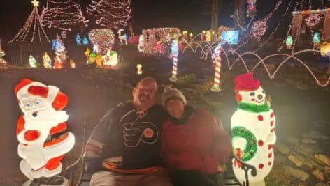 Gary and Deb Habermann in front of their Coatesville Christmas Display.