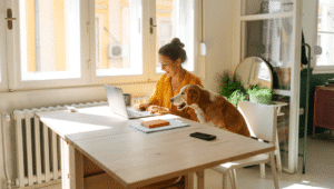 woman doing work from home with dog