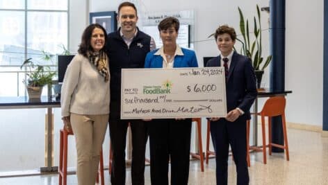 From left, Kelly Catania, Director of Christian Service at Malvern Prep, Patrick Sillup, Head of School at Malvern Prep, Andrea Youndt, CEO of Chester County Food Bank, and Mateo Alban.
