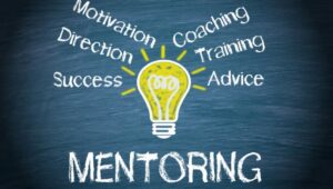 A poster highlighting the advantages of using a SCORE mentor for your small business.