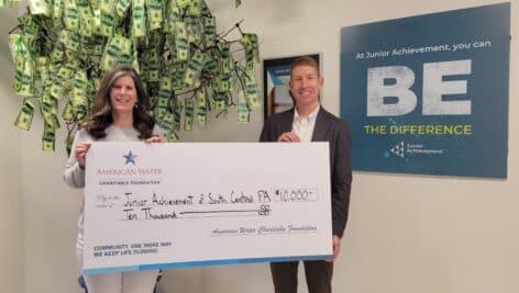 Pennsylvania American Water President Justin Ladner presents 2023 Workforce Readiness and STEM Education Grant check to Junior Achievement of South Central Pennsylvania