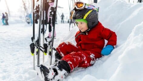 Young boy enjoying a day on the slopes.