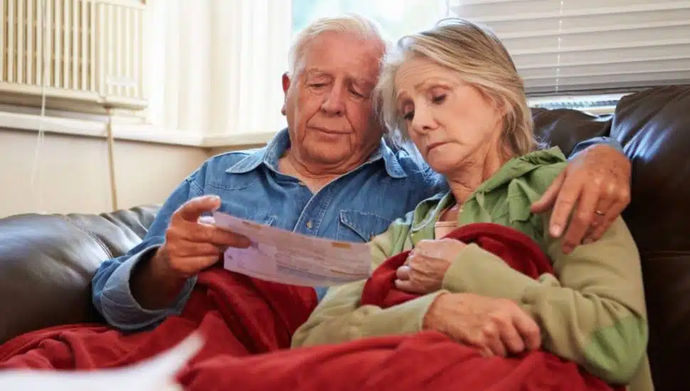 couple with a bill