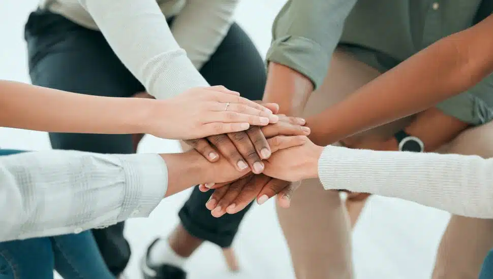 team helping hands