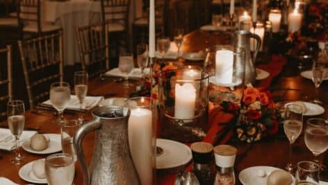 tableware and candles on table for wedding