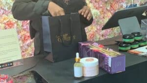 woman putting purchases into bag