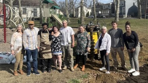 A Safe Harbor team gathers at a community garden site, which is being expanded and revitalized in West Chester.