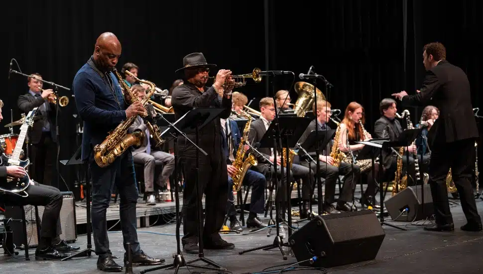 Musicians playing jazz on stage