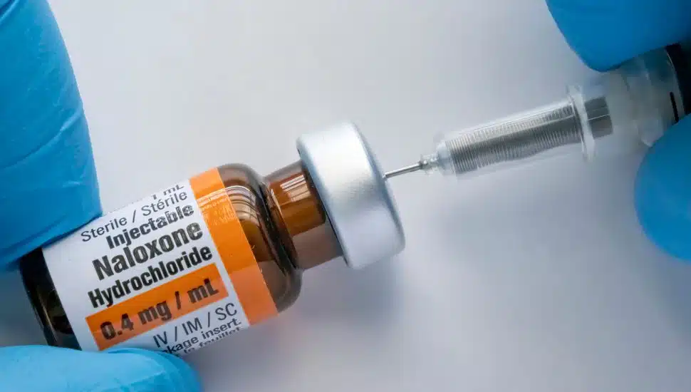 Naloxone with needle
