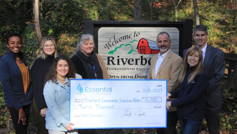 Individuals from Riverbend, Aqua Pennsylvania, and Upper Darby holding the check presented by Aqua Pennsylvania.