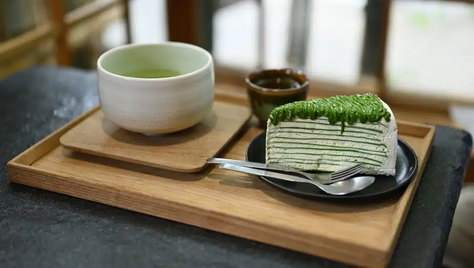 matcha drink with matcha crepe cake slice