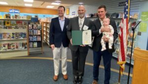 From L-R: Chester County Commissioner Eric Roe, CCLS Executive Director Joe Sherwood, Chester County Commissioner Josh Maxwell, and future patron, Rory Maxwell at the Chester County Library System Breakfast.