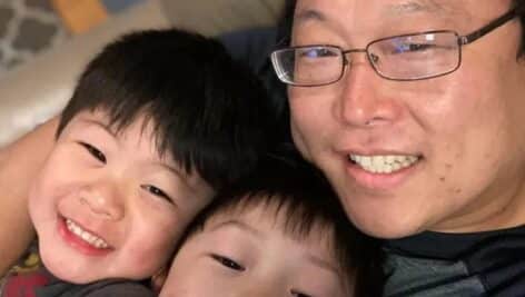 Hyon Duk Shin with his two children.